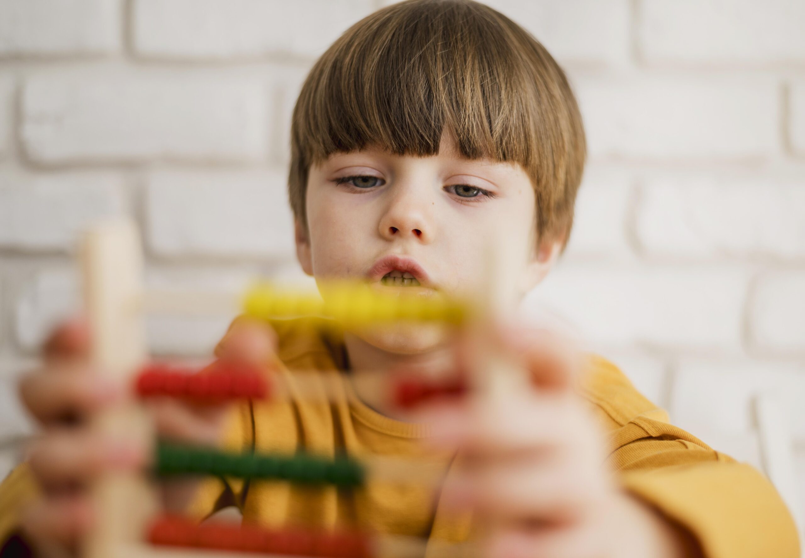 A child using an abacus at home