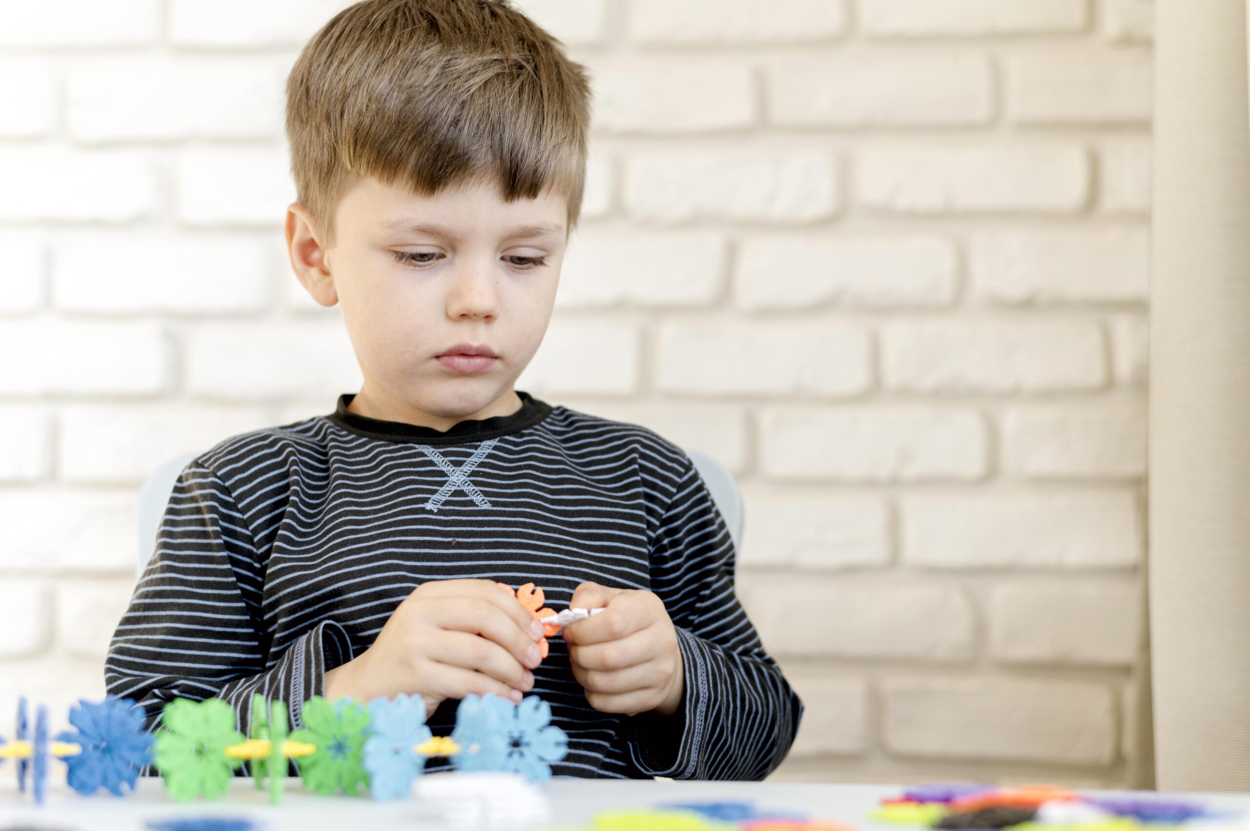 A child being creative with art supplies