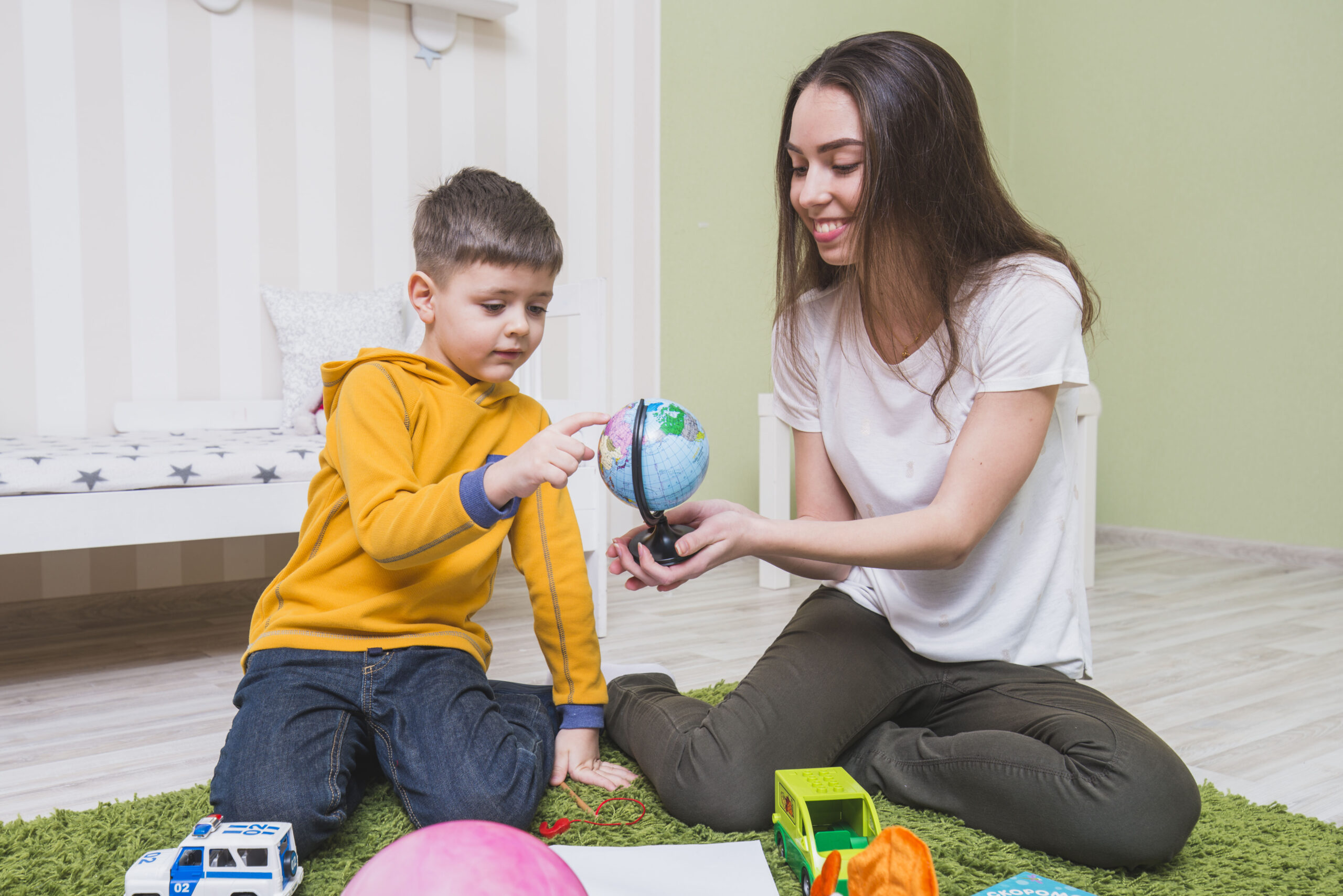 A mother and son learning geography together